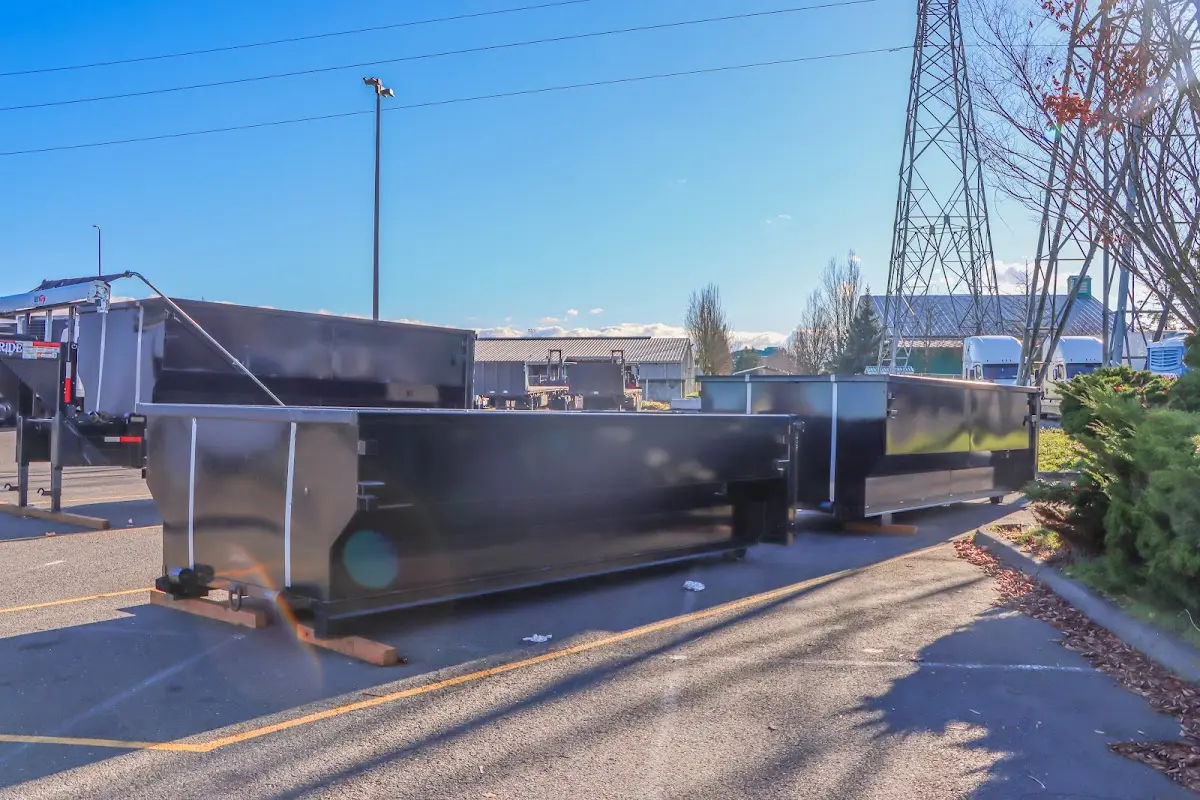 Roll-off dumpster ready for waste disposal at job site for 4 Yard Dumpster Rental in Graham